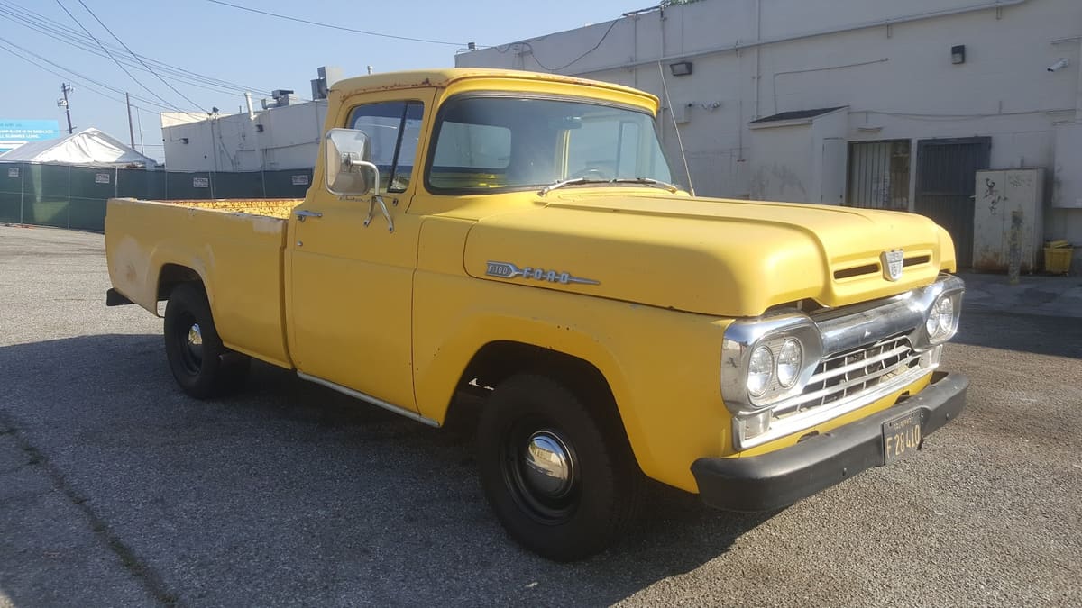 Classic yellow Ford F-100 pickup bought by 805 Cash For Cars